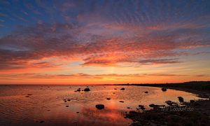  Päikeseloojang rannas